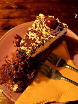 Chocolate cake with cherriess  at Cafe Harvest in Vienna