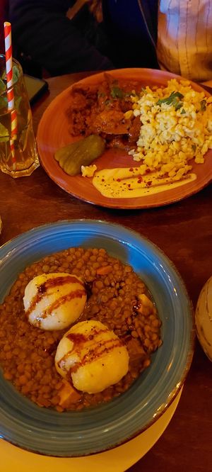 Specklinsen mit Knödel und Rahmgulasch mit Nockerl at Cafe Harvest in Vienna