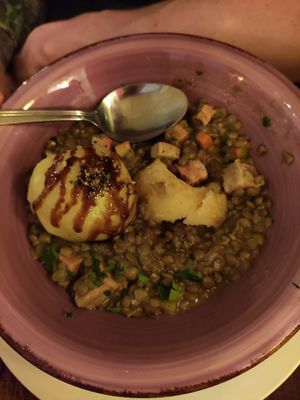 Bacon lentils with potato dumplings at Cafe Harvest in Vienna