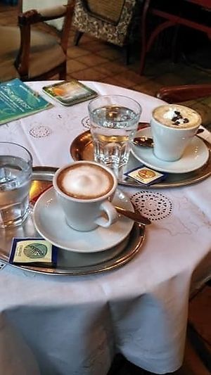 An irish coffee + a capuccino at Cafe Harvest in Vienna