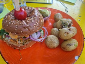 Cheeseburger with potatoes at Cafe Harvest in Vienna