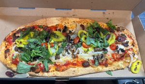 Mushrooms, onions, tomatoes, banana peppers, olives and basil.  So good!!  at IAD - &pizza - CC in Dulles
