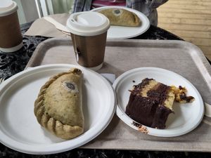 Phat vegan keralan cauliflower, chick-pea & onion bhaji pasty, with 'jaffa cake' sponge, & breakfast tea with soya milk at Abbotsbury Subtropical Gardens - The Tea Room in Weymouth