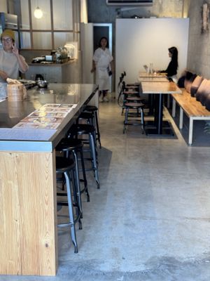 Kitchen and indoor seating  at Hakumokka in Onna