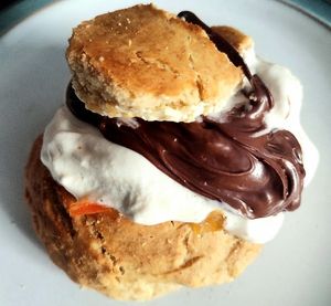 Giant breakfast scone, warm from the oven & filled with vegan butter, homemade orange marmalade, rich chocolate spread, & vegan whipped cream. at Loaf BnB in Berwick-upon-tweed