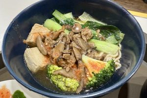 Mushroom dumpling soup (with broccoli instead of dumplings since the dumplings aren’t vegan)  at Veggie House 一芳 - HarbourFront in Central Singapore