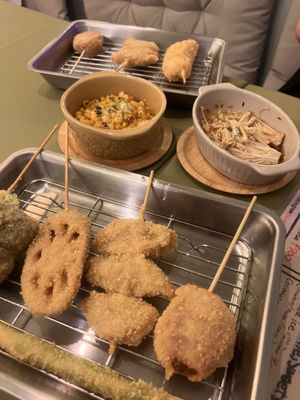 Buttered corn, enoki. Skewers - soy meat, beyond meat, banana, asparagus, broccoli, lotus root  at Shinsekai Paprika Shokudo Vegan in Osaka