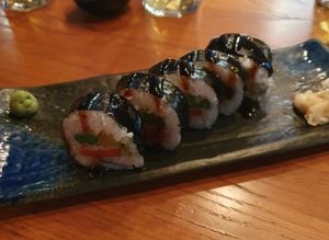 Plant Powered Roll: Tempura, asparagus, avocado, red pepper, pickled raddish, teriyaki sauce at Zumuku Sushi in Wilmslow