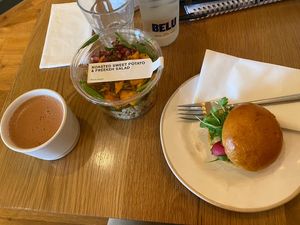 Chickpea and avocado roll, sweet potato salad and dark choc hot chocolate  at GAIL's Bakery in Wilmslow