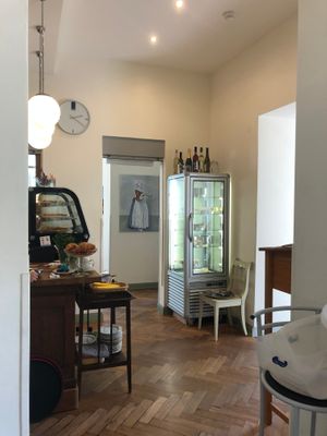 Cake cabinet and antique floorings at Kaffeehaus Stellwerk in Balduinstein