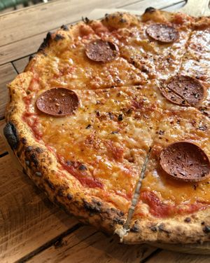 𝐏𝐞𝐩𝐩𝐞𝐫𝐨𝐧𝐢 - Tomato base with Mozzarella (vegan). Vegan pepperoni, chilli flakes, extra virgin olive oil  at Pizza by Vinnie - The Oil Basin Brewhouse in Worcester