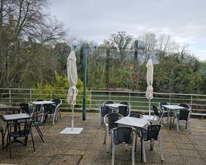 Outdoor sitting overlooking the lake. at Dona Sardinha in Luso