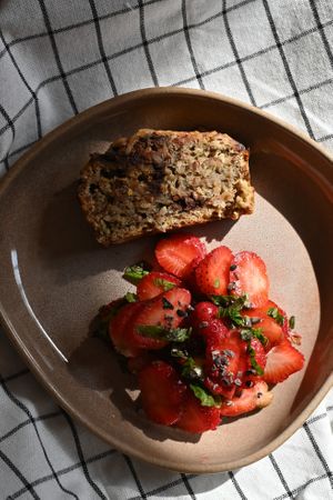 Vegan Breakfast with Banana Bread and strawberry salad with mint and cacao nibs at Between Tides in Lobitos