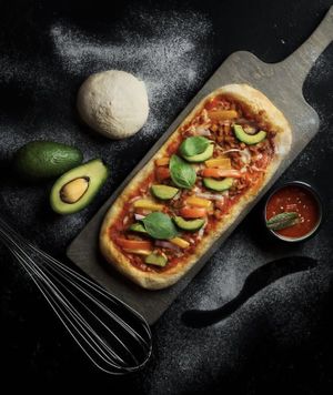 Avocado pizza  at Natùr in Tehran