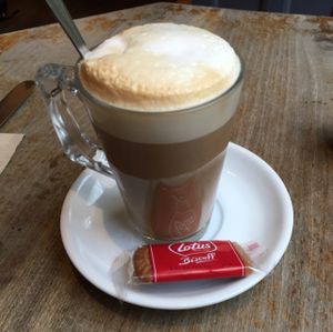 Soya latte with a Lotus biscuit at Aubrey's Traditional Creperie in Nottingham