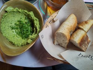 Green Hummus with warm bread at Helga in Konstanz