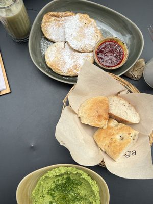 Hummus with pita bread and pancakes with berries  at Helga in Konstanz