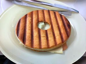 Donut with ham and cheese at Areca Bakery in Barcelona