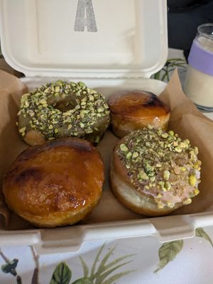 Creme brulée and pistachio doughnuts at Areca Bakery in Barcelona