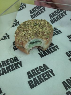 Pistachio doughnut at Areca Bakery in Barcelona