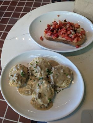 Biscuits & gravy and bruschetta toast at Looking Meadow Cafe in Maplewood
