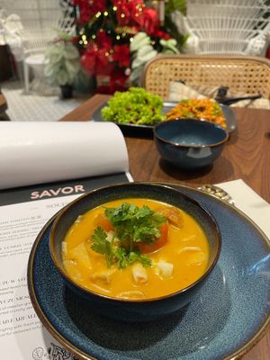 TOMMY YUMMY (TOM YUM) RM20
A medley of coco squid, cauliflower, oyster mushrooms, seaweed tofu, young coconut, fresh coriander, and creamy coconut milk
 at SAVOR in Kuala Lumpur