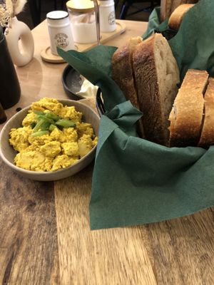 Tofu scramble and sourdough   at Café Hin & Veg in Leipzig