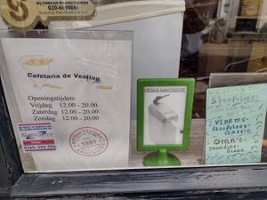 Vegan mayo advertised in front window at Cafetaria De Vesting in Naarden