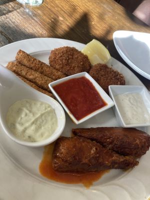 Appetizer trio: mozzarella sticks, crab cakes, Buffalo wings  at 3 Brothers Pizza Cafe in Farmingdale