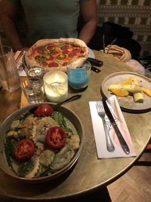 Pepperoni pizza, ravioli and leek  at Vegitalian in Amsterdam