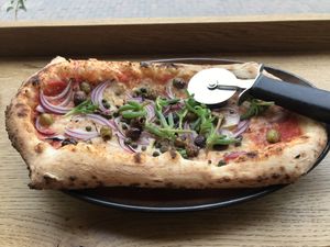 Sunny puttanesca pizzetta  at Vegitalian in Amsterdam