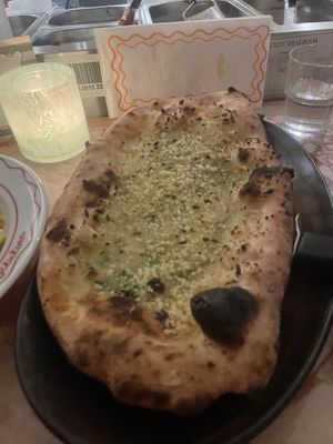 Cheezy garlic pizzetta  at Vegitalian in Amsterdam