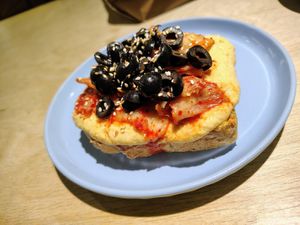 Hummus con kimchi at Café Área in Santiago