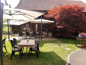 Garden seating at Landgasthof Grossteil in Giswil