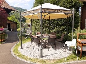 Garden seating at Landgasthof Grossteil in Giswil