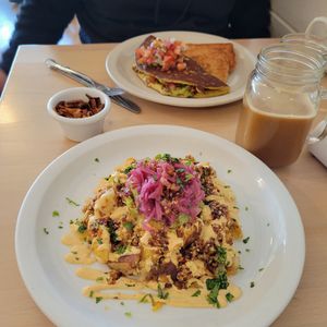 Vegan cashew omelette (w/ side of coconut bacon) and kimchi chilaquiles and carrot cake latte. at From Seed to Sprout in Avon By The Sea
