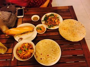 pictured: pork floss bahn mi, bean curry (bottom) and spicy tofu salad with crispy rice paper (actually very spicy!) at Karma Waters in Da Nang