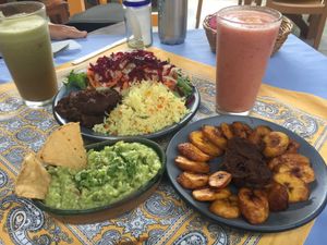 Asked for an order of guacamole, their house salad with a side of beans and rice that are vegan. As well as an order of beans with fried plantains. So good and so filling, two of us shared it! at Yerbabuena del Sisal in Valladolid