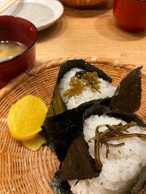 plate of 2 onigiri: leaf mustard, sea kelp at Nigirimeshi Ginka in Morioka