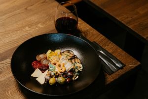 Artichokes Hearts, Olives, Sun-Dried Tomatoes, Grilled Vegetables, Plant-based Cheese, Baby Onions with Bread, Taralli, and Chickpea Cream at Primo Pasta Amsterdam in Amsterdam