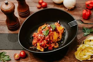 Tagliatelle Pasta with a tomato sauce and added smokiness. A very true classic! at Primo Pasta Amsterdam in Amsterdam