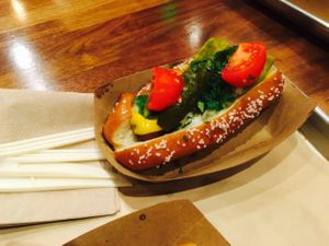 Chicago vegan dog on a pretzel bun at Linx in Orange