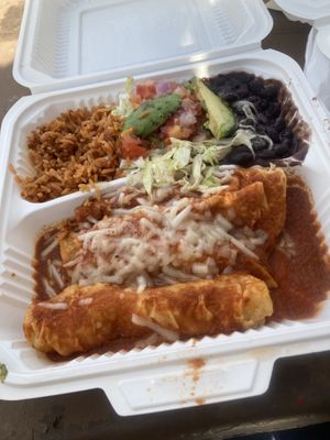 Delicious beans, rice, and pico. The jackfruit enchiladas were pretty good to, the sauce was okay. Over all this dish was delicious !!  at The Happy Hooligans in San Jose