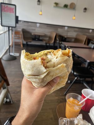 Breakfast Burrito: mostly tater tots & not much flavor. had the spam bacon strips that tasted more like spam than bacon  at The Happy Hooligans in San Jose