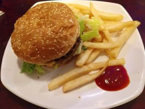 Extremely delicious burgers and fries here! at The Happy Hooligans in San Jose
