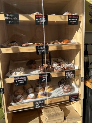 Pastry cabinet - vegan options labelled   at Aurora Argentinian Bakery in Wellington