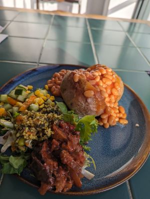 Jacket potato with a nice salad. at Cwtch Cafe - YMa Pontypridd in Pontypridd