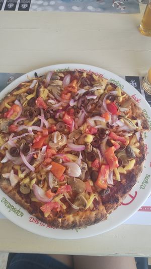 vegan pizza with olives instead of pepper at Maistro - Μαίστρο in Corfu