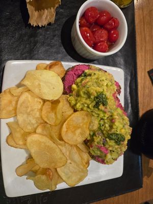 Sourdough with beetroot hummus and guacamole at Farro in Rio De Janeiro