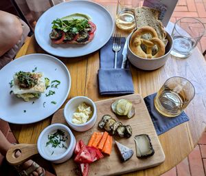 Vegan 'Brotzeit' and 'Maultaschen' with potato salad at Laut Café in Tabanan